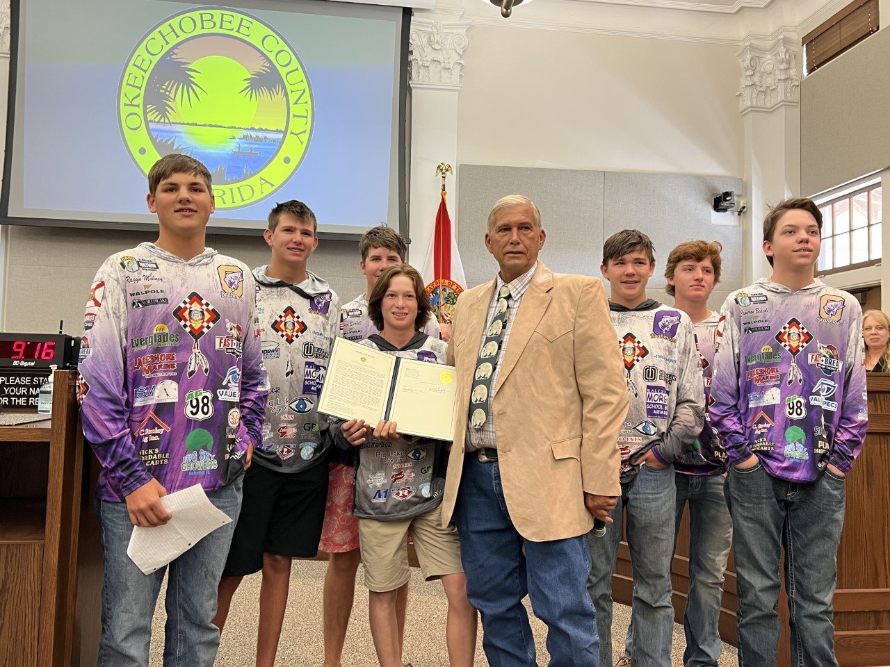 OKEECHOBEE -- The Okeechobee County Commission honored the Okeechobee High School Bass Club during the March 9 commission meeting in the Historic Okeechobee County Courthouse .